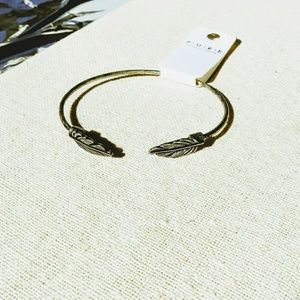 Double feather metallic silver cuff bracelet